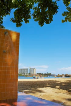 Outdoor showers on an empty beach, Condado Beach, San Juan, Puerto Rico