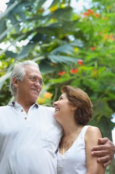 Senior couple standing together and smiling
