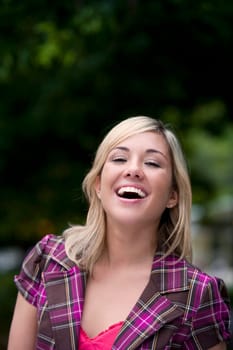 Portrait of a young woman laughing