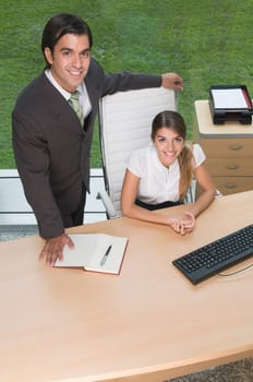 business executives smiling in an office