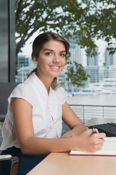 Portrait of a businesswoman working in an office