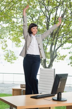 Businesswoman looking excited in an office