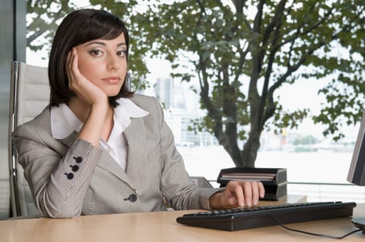 Portrait of a businesswoman working in an office