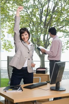 Businesswoman looking excited in an office