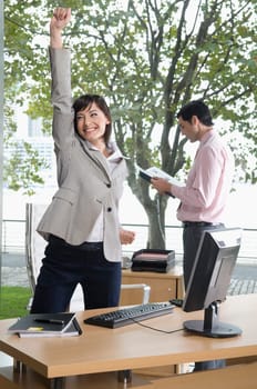 Businesswoman looking excited in an office