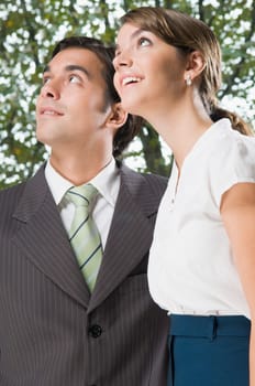 business executives looking up in an office