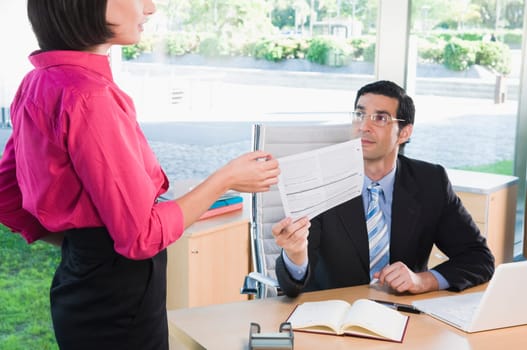 business executives working in an office