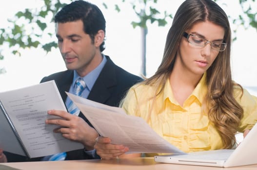 business executives working in an office