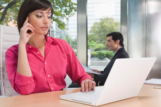 business executives working in an office