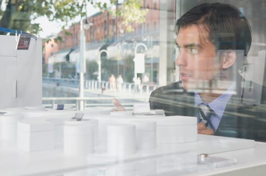 Businessman looking at an architectural model