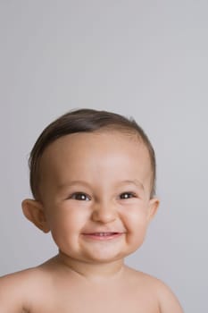 Close-up of a baby boy smiling