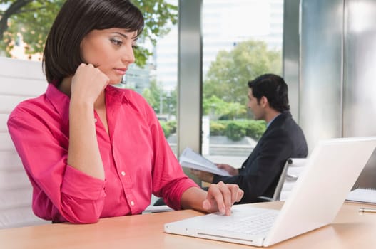 business executives working in an office
