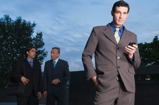Portrait of a businessman using a mobile phone