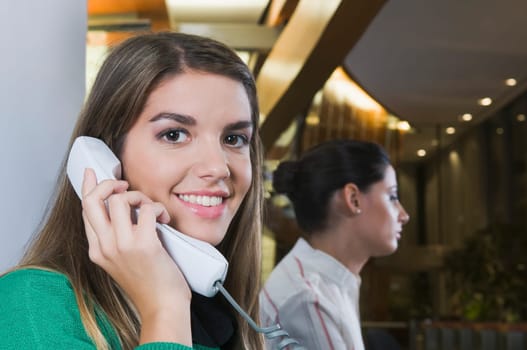 Female customer service representatives working in an office