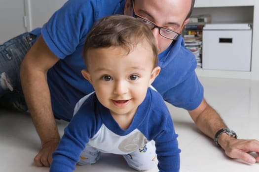 Man playing with his son