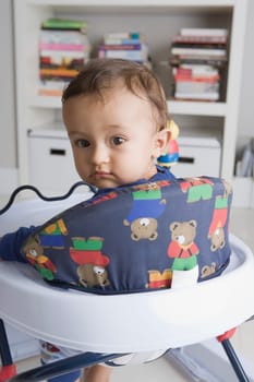 Baby boy in a walker