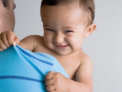 Man carrying his son