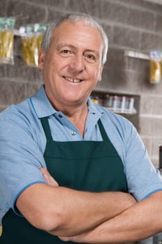 Portrait of a sales clerk smiling in a hardware store