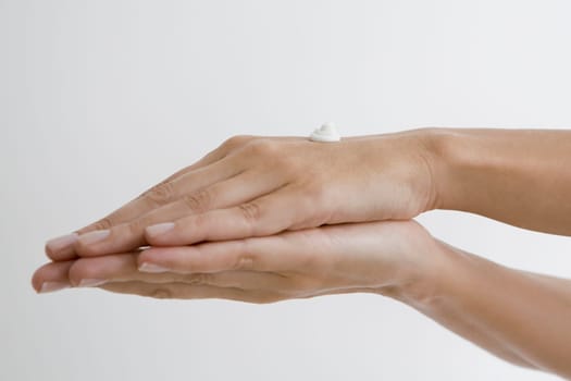 Close-up of moisturizer on a woman's hands