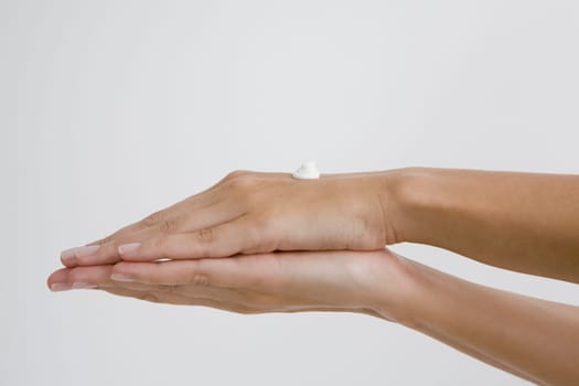 Close-up of moisturizer on a woman's hands