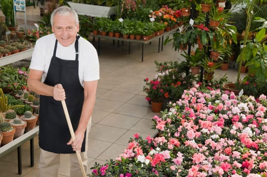 Man working in a garden center