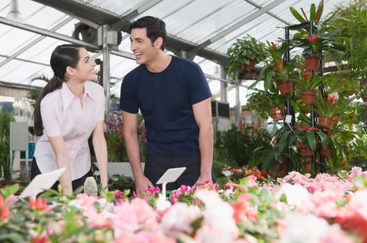 Couple smiling in a garden center