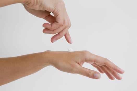 Close-up of moisturizer on a woman's hand