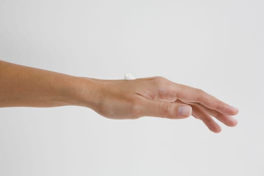 Close-up of moisturizer on a woman's hand