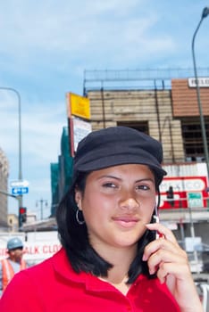 Close-up of a young woman talking on a mobile phone