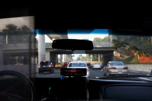 Cab meter on the dashboard of a car