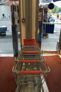 Empty shopping carts in a supermarket