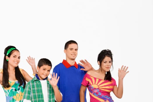 Portrait of four people waving their hands