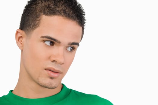 Close-up of a young man thinking