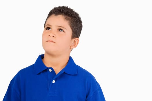 Close-up of a boy looking up