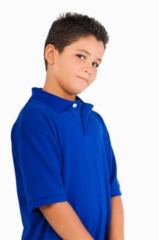 Close-up of a boy smirking