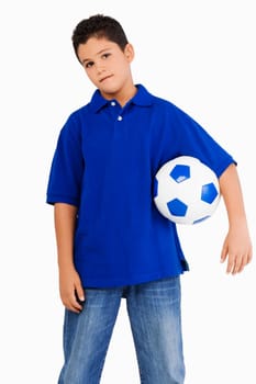 Portrait of a boy holding a soccer ball