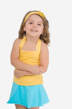 Portrait of a girl standing with her arms crossed and smiling