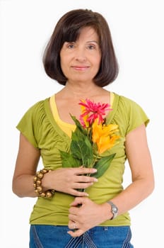 Portrait of a senior woman holding flowers