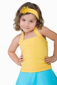 Portrait of a girl standing with arms akimbo