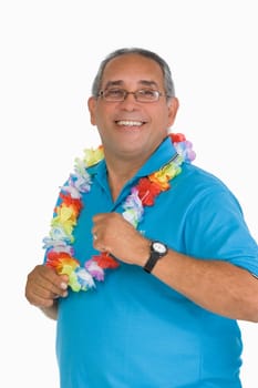 Portrait of a mature man smiling with a garland around his neck