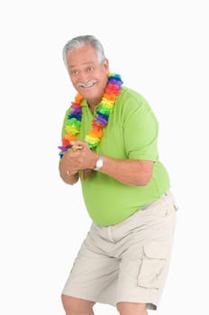 Senior man playing ukulele and smiling