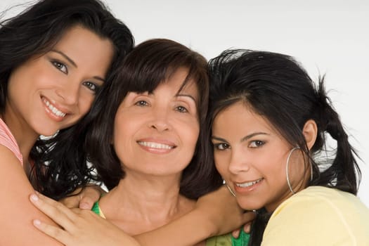 Portrait of a senior woman with her two daughters smiling