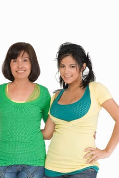 Senior woman standing with her daughter and smiling