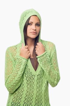 Portrait of a young woman holding collars of her hooded shirt