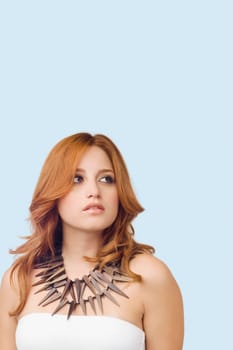 Close-up of a young woman wearing a necklace