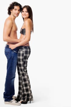 Portrait of a young couple standing together and smiling