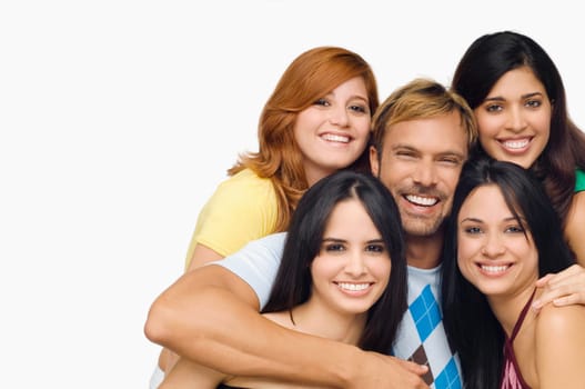 Portrait of a mid adult man posing with four young women