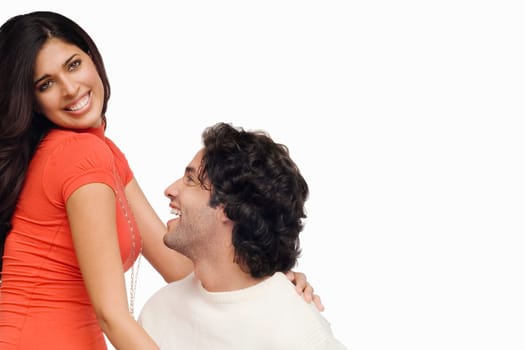 Close-up of a young couple smiling