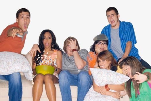 Group of friends watching television
