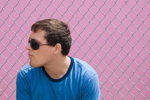 Close-up of a young man wearing sunglasses